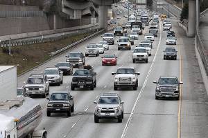 Vehicles heading north start to backup on I-5 at exit 192 as rush hour began on Thursday. (Lizz Giordano / The Herald)