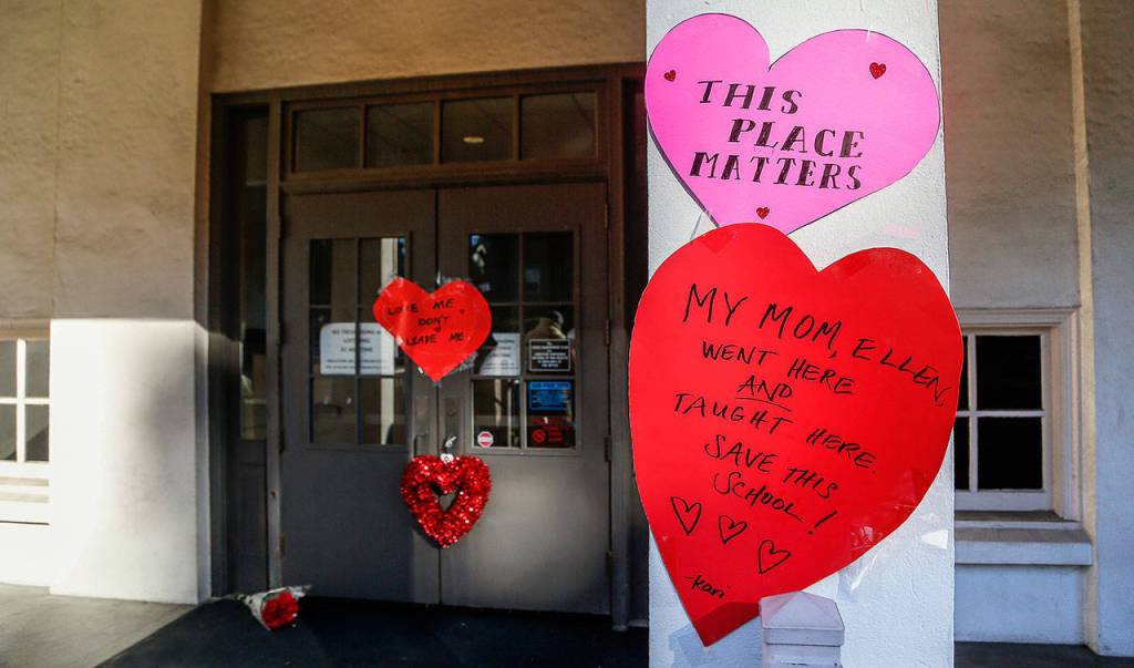 Paper hearts convey the strong and personal sentiments of people hoping to spare the old Longfellow School from the wrecking ball. (Dan Bates / The Herald)