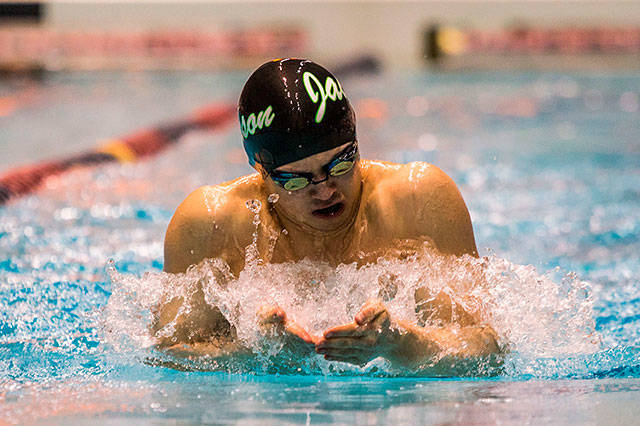 Jacksons Justin Limberg competes in the 100 yard breaststroke during the Class 4A Boys Swim/Dive Championships on Feb. 16 at King County Aqutics Center in Federal Way. (Olivia Vanni / The Herald)