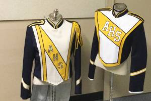 Donations, hard work earn Arlington school band new uniforms