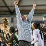 Edmonds-Woodway head coach Jon Rasmussen celebrates after Bethels Tiarra Brown fouls out of the game during the game against Bethel at the 3A Girls Hardwood Classic on Feb. 27 in Tacoma. (Olivia Vanni / The Herald)