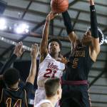 Marysville Pilchucks RaeQuan Battle attempts a pass with ODeas Jaylon Ellis (left) and Paolo Banchero defending at the Tacoma Dome on Feb. 28. The Tomahawks lost 63-53. (Kevin Clark / The Herald)