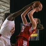 Kamiakins Oumou Toure blocks Snohomishs Ella Gallatin at the Tacoma Dome on Feb. 28. The Panthers lost 57-39. (Kevin Clark / The Herald)
