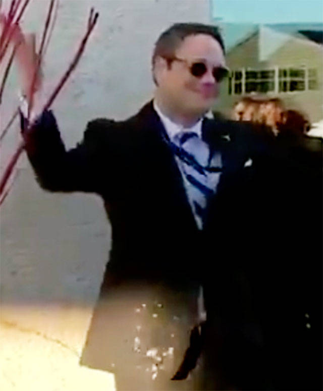 Screen shot from video of Brett Smith after christening the building at Paine Field airport on Monday.