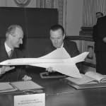 In this Nov. 29, 1962 photo, Geoffroy de Courcel (left), the French ambassador in London, and Julian Amery, the British minister of aviation, look at a model of a proposed supersonic airliner at Lancaster House, London, where they signed an Anglo-French agreement for the joint development of a supersonic passenger airplane. (AP Photo, File)