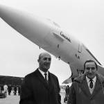 In this Dec. 11, 1967 photo, test pilots Andre Turcat (right) of France and British pilot Brian Trubshaw (left) stand in front of the prototype of the jet during its roll out ceremony in Toulouse, France. (AP Photo/Peter Kemp, File)