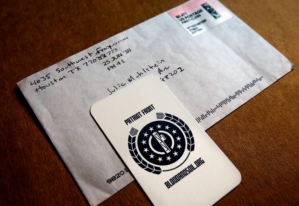 Herald columnist Julie Muhlstein received this card in the mail at her Everett home in 2018, from the Texas-based neo-Nazi organization Patriot Front. It arrived a month after Muhlstein wrote about the groups fliers being posted at Everett Community College and in her neighborhood. (Dan Bates / Herald file)