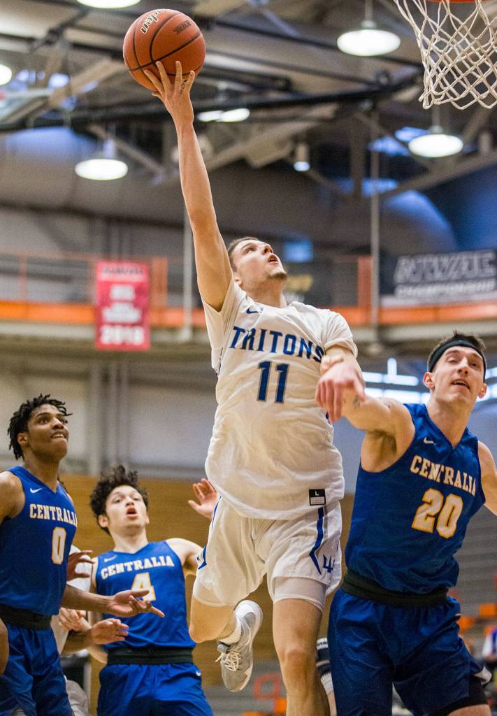 Edmonds Drew Magaoay attempts a layup during an NWAC mens basketball tournament game against Centralia on Thursday in Everett. (Olivia Vanni / The Herald)