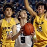Point guard Ben Olesen (center) helped lead Jackson to the Wesco 4A title and a Hardwood Classic appearance. (Kevin Clark / The Herald)