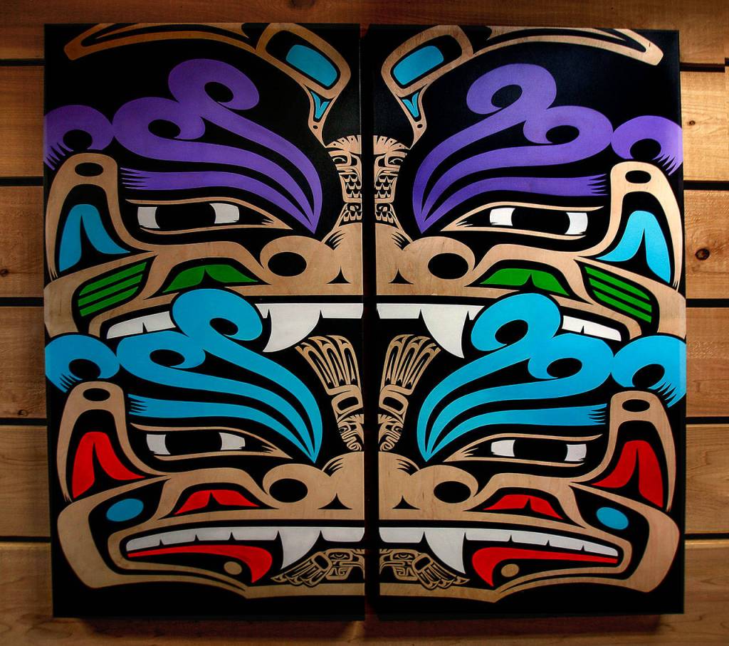 The Guardian, a screen print artwork by Louie Gong, represents the eighth generation. It welcomes visitors to a new space for Native students in Monte Cristo Hall at Everett Community College. (Dan Bates / The Herald)