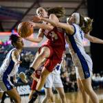 Maya DuChesne attempts a layup against Seattle Prep in the opening round of the 3A Hardwood Classic in the Tacoma Dome. In the closing seconds of the contest, she made a game-winning 3-pointer to send Snohomish to the state quarterfinals. (Olivia Vanni / The Herald)