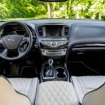 Easy to use controls, including large buttons and knobs for the infotainment and climate control systems, highlight the 2019 Infiniti QX60 interior. (Manufacturer photo)