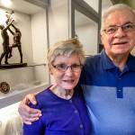 With a bronze sculpture of the Irish sport of hurling in the background, John Keane and his wife Maureen talk about his homeland, his role as Honorary Consul of Ireland in Seattle, and American St. Patricks Day traditions they dont observe. (Dan Bates / The Herald)