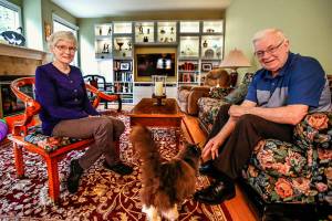 John and Maureen Keane talk about his homeland of Ireland in their Edmonds living room. He is the Honorary Consul of Ireland in Seattle and a longtime member of the Irish Heritage Club that presents Irish Week activities. (Dan Bates / The Herald)
