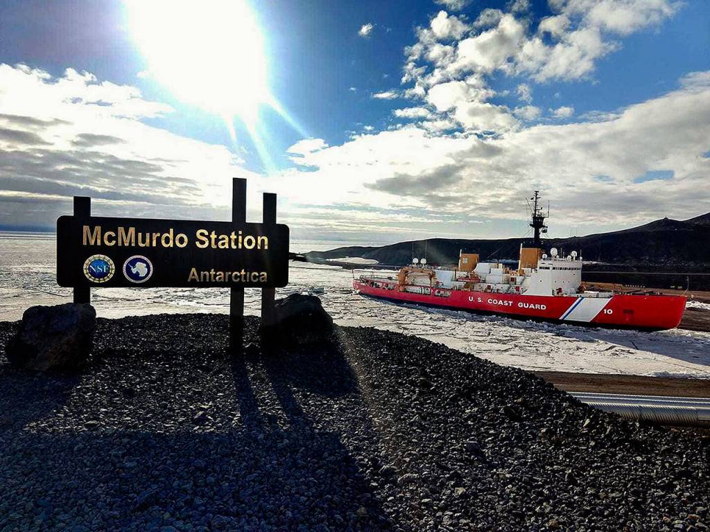 The U.S. Coast Guards Polar Star, a heavy icebreaker, at McMurdo Station in Antarctica during its recent 105-day deployment. (Photo Courtesy U.S. Coast Guard)