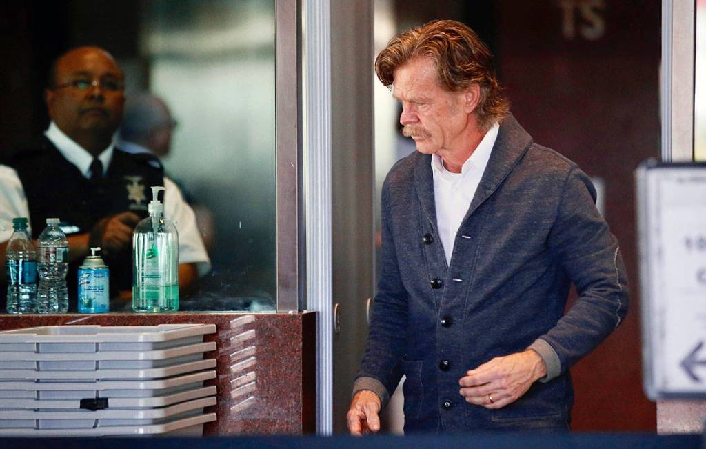 Actor William H. Macy arrives at the federal courthouse in Los Angeles on Tuesday. Fifty people, including Macys wife, actress Felicity Huffman, were charged Tuesday in a scheme in which wealthy parents allegedly bribed college coaches and other insiders to get their children into some of the nations most elite schools. Macy was not charged; authorities did not say why. (AP Photo/Alex Gallardo)
