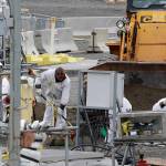 In this 2013 photo, workers are shown at the C Tank Farm at the Hanford Nuclear Reservation, near Richland. (AP Photo/Ted S. Warren, File)
