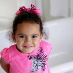 In this 2013 photo, Veronica, 3, a child at the center of an international adoption dispute at the time, smiles in a bathroom of the Cherokee Nation Jack Brown Center in Tahlequah, Oklahoma. (Mike Simons/Tulsa World via AP, File)
