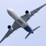 An Airbus SAS A350 XWB aircraft performs a flying display on the opening day of the 51st International Paris Air Show in Paris on June 15, 2015. French President Emmanuel Macron will discuss a major Airbus order during his Chinese counterpart Xi Jinpings state visit to France later this month. (Jasper Juinen/Bloomberg, file)