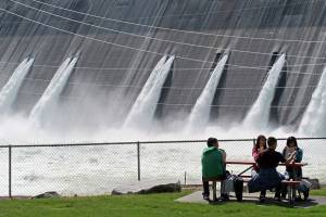 Columbia River water is released through the outlet tubes at Grand Coulee Dam in 2011. The way dams and storage reservoirs on the Columbia River and its tributaries are managed could change dramatically in a short five years if negotiators from the United States and Canada dont strike a deal. At issue is the Columbia River Treaty, a transboundary agreement that has governed flood risk management and hydropower production for more than five decades. (AP Photo/Nicholas K. Geranios, File)