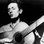 Woody Guthrie (1912-1967) was known for his many folk songs, including This Land is Your Land and the state song, Roll On Columbia. (Associated Press)