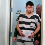 In this 2019 photo, Wilber Ernesto Martinez-Guzman, 19, of El Salvador, is escorted into the courtroom for his initial appearance in Carson City Justice Court in Carson City, Nevada. (AP Photo/Scott Sonner, File)