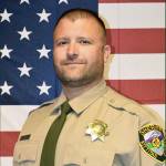 This undated photo released by the Kittitas County Sheriffs Office shows Deputy Ryan Thompson, who was shot and killed and a police officer was wounded after they exchanged gunfire with a road rage driving suspect Tuesday. (Kittitas County Sheriffs Office via AP)