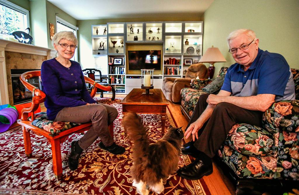 John and Maureen Keane talk about his homeland of Ireland in their Edmonds living room. He is the Honorary Consul of Ireland in Seattle and a longtime member of the Irish Heritage Club that presents Irish Week activities. (Dan Bates / The Herald)