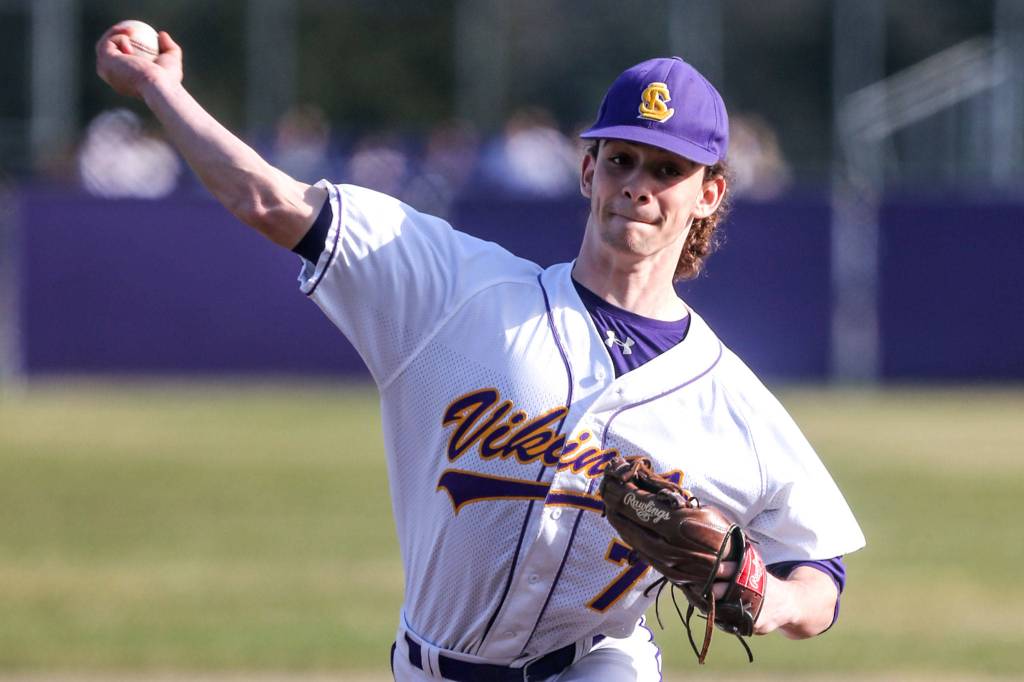 Lake Stevens Xander Fogel pitches against Meadowdale at Lake Stevens High School on March 21, 2019. (Kevin Clark / The Herald)