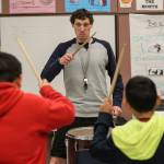 Pat Jameson leads the drum circle during practice at Challenger Elementary in Everett on March 6, 2019. (Kevin Clark / The Herald)