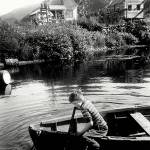 Bobby Day in the skiff at Dayville on Prince William Sound in about 1953. Day became a fisherman before the Exxon Valdez oil spill. (Gloria Day Collection)