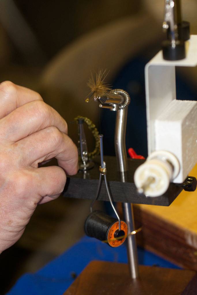 The Evergreen Hand allows people to tie a fishing fly using only one hand. (Mike Benbow)