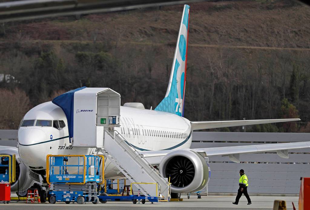 This March 14 photo shows a Boeing 737 Max 8 airplane parked at Boeing Field in Seattle. (AP Photo/Ted S. Warren, File)