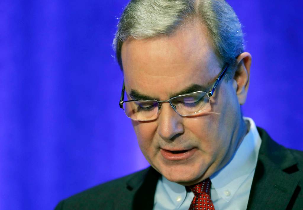 Mike Sinnett, Boeings Vice President of Product Strategy, reads from notes as he talks to reporters on Wednesday about software and training updates for their 737 MAX 8 airplane in Renton. (AP Photo/Ted S. Warren)