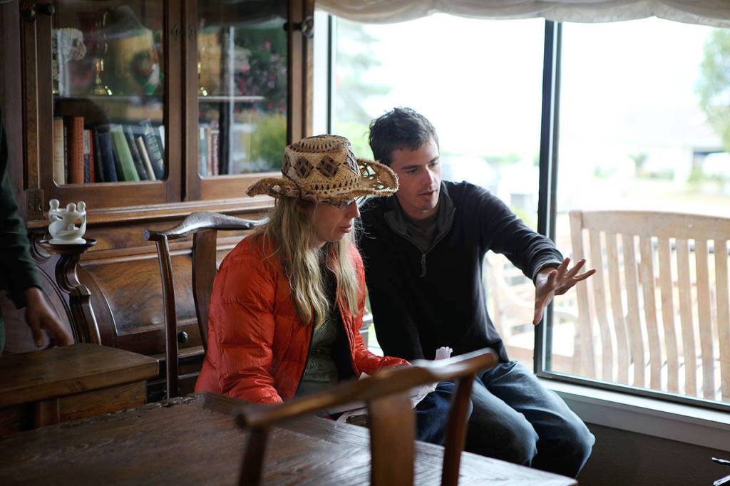 Holly Chadwick and Alex Walker, director of photography, set up a shot during the filming of Sounds of Freedom. (Contributed photo)