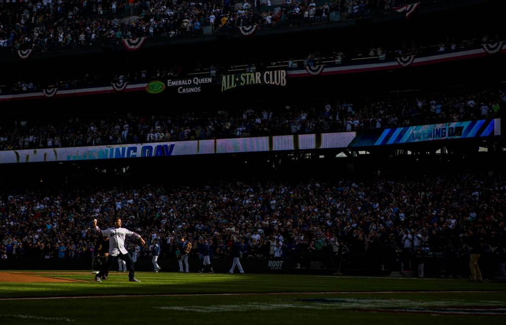 Edgar Martinez throws out the first pitch during Opening Day at T-Mobile Park on Thursday, March 28, 2019 in Seattle, Wash. (Olivia Vanni / The Herald)