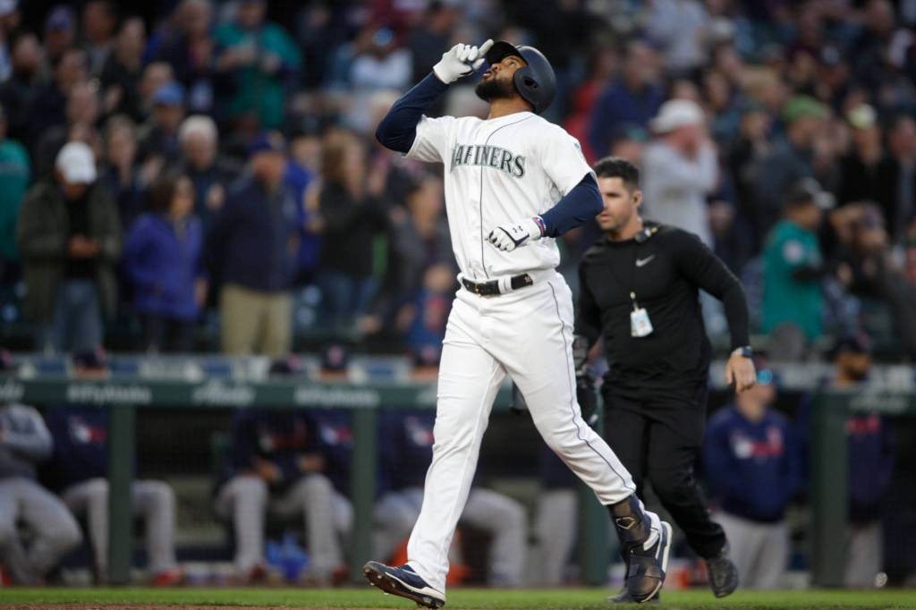 Mariners Domingo Santana looks up as he celebrates a two-run homer as the Seattle Mariners beat the Boston Red Sox 12-4 at T-Mobile Park on Thursday, March 28, 2019 in Seattle, Wash. (Andy Bronson / The Herald)
