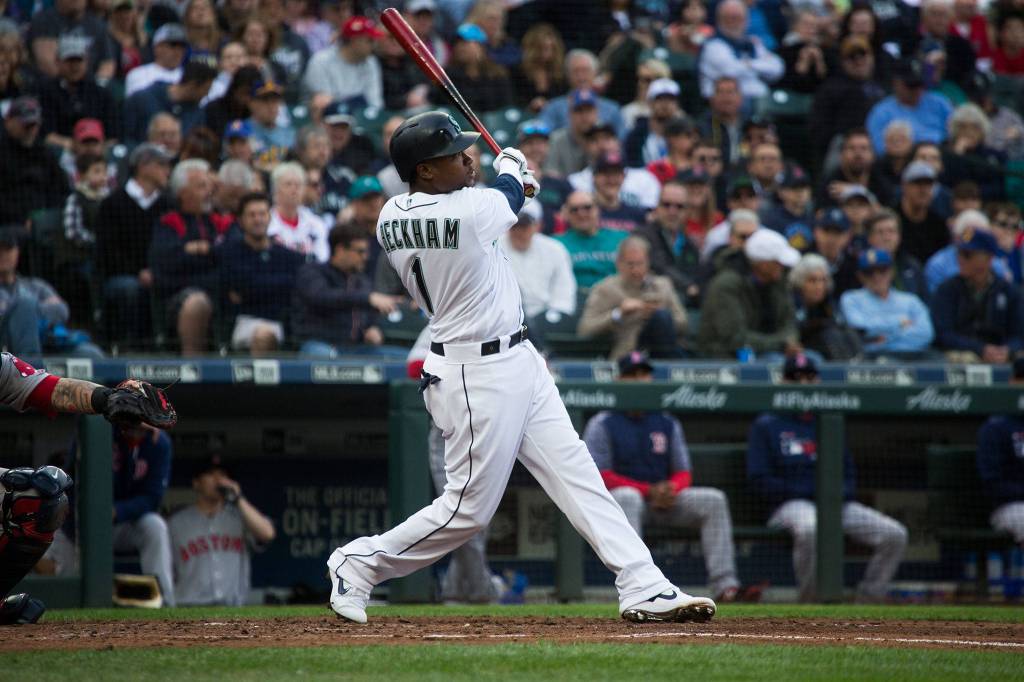 Mariners Tim Beckham watches the ball fly for a solo home run as the Seattle Mariners took on the Boston Red Sox at T-Mobile Park on Thursday, March 28, 2019 in Seattle, Wash. (Andy Bronson / The Herald)