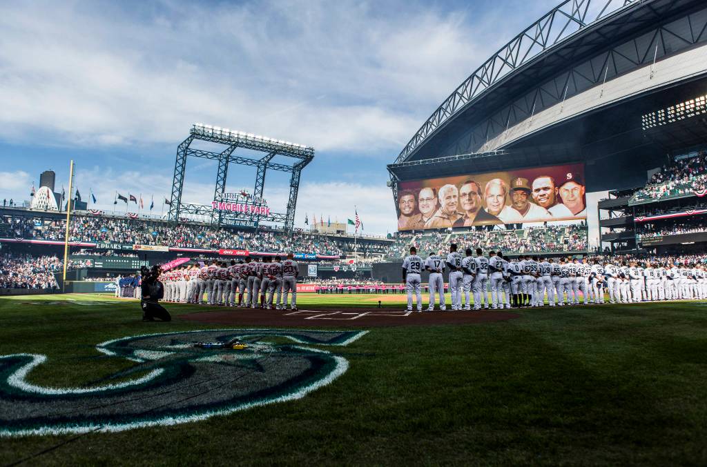 A moment of silence is taken before the start of the Opening Day game against the Boston Red Sox at T-Mobile Park on Thursday, March 28, 2019 in Seattle, Wash. (Olivia Vanni / The Herald)