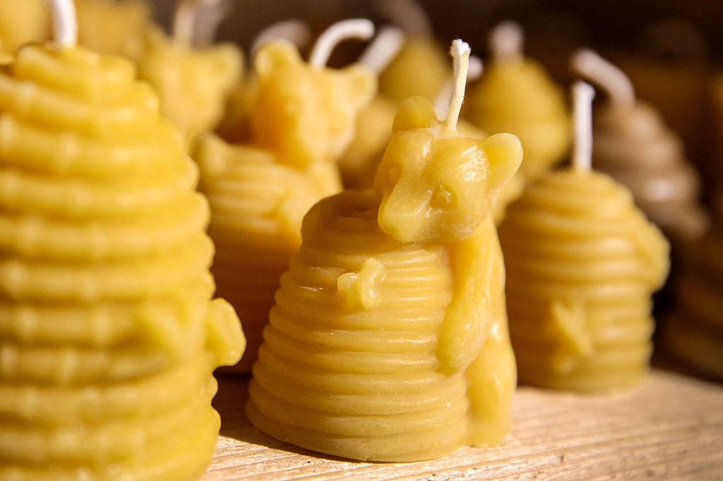 Locally produced beeswax candles for sale at Snohomish Bee Co. (Kevin Clark / The Herald)