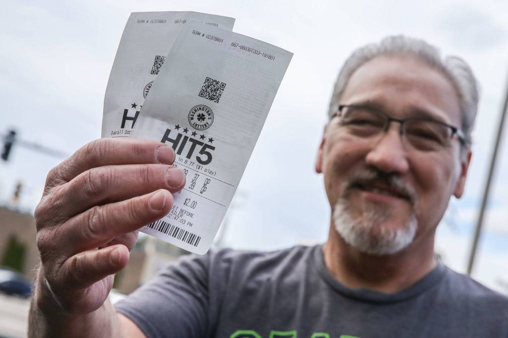 Mike Robinson, 61, won $190,000 on a Hit 5 ticket purchased at the Silver Lake Safeway. He started buying tickets after surviving stage 4 cancer in 2015. (Kevin Clark / The Herald)