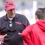 Mountlake Terrace track and field coach Russ Vincent (left) talks with Brandon Bach before last weeks meet at Edmonds-Woodway High School. (Kevin Clark / The Herald)