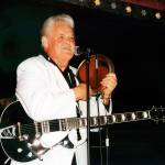 Rockabilly Hall of Famer Billy Adams performs in Hemsby, England, in 2002. Adams, who wrote and recorded a rockabilly staple Rock, Pretty Mama, died Saturday in Westmoreland, Tennessee. He was 79. (Redbush Classics Records via AP)