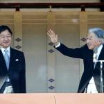 In this January 2018 photo, Japans Emperor Akihito (right), with Crown Prince Naruhito, waves to well-wishers from the bullet-proofed balcony during his New Years public appearance with his family members at Imperial Palace in Tokyo. (AP Photo/Eugene Hoshiko, File)