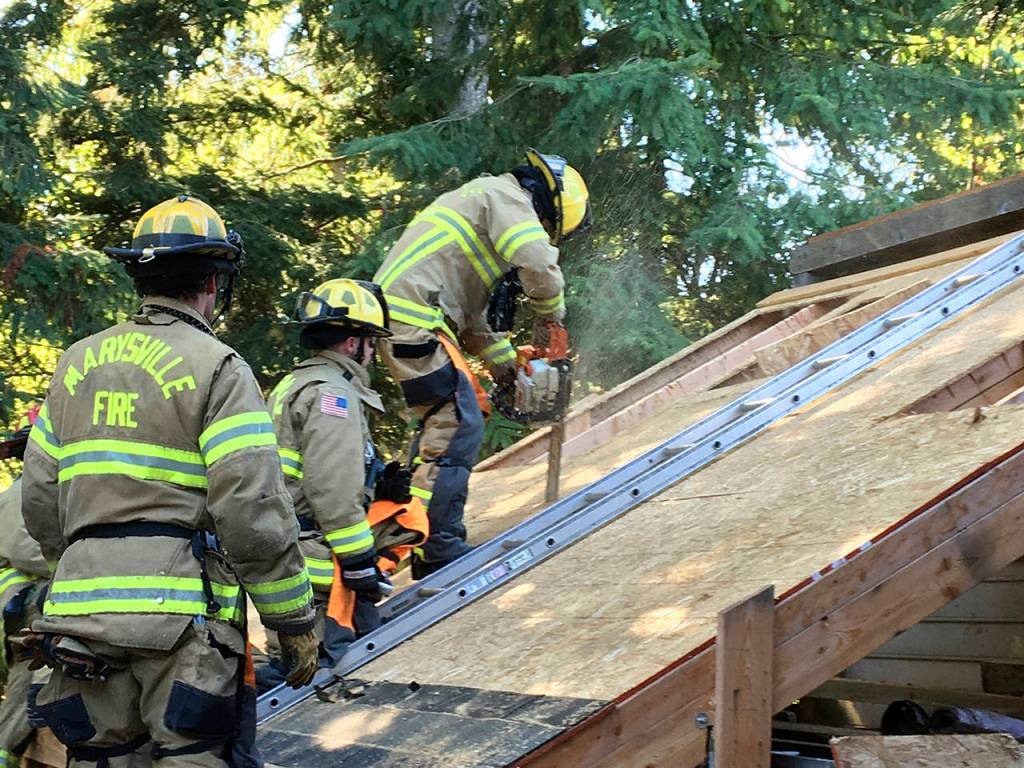 Tuesdays training drill in Marysville focused on ventilation, in which holes are cut in roofs to release poisonous gases. (Marysville Fire District)