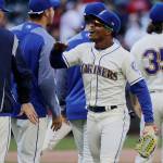 The Mariners Mallex Smith celebrates with teammates after a 10-8 win over the Red Sox on March 31, 2019, in Seattle. (AP Photo/Ted S. Warren)