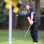 Kamiaks Devin Kim putts during the Tom Dolan Memorial Invitational golf tournament Monday afternoon at Everett Golf & County Club in Everett on April 8, 2019. (Kevin Clark / The Herald)