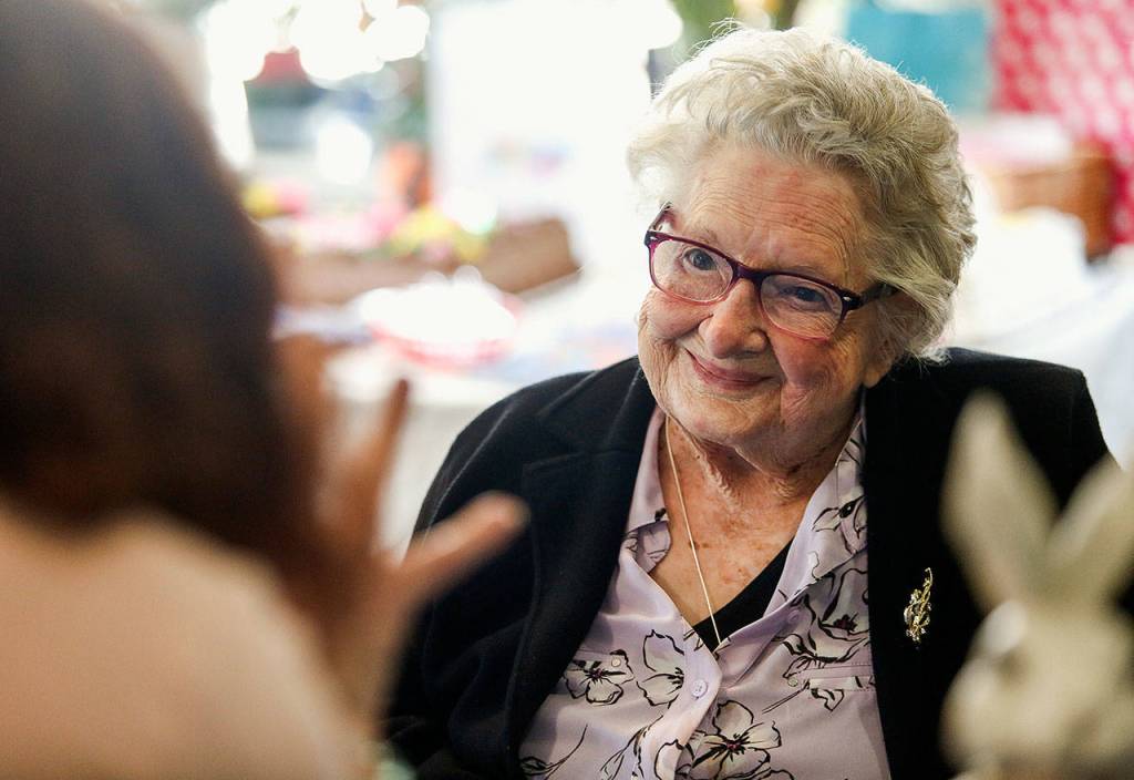 During her party, sunlight spills into the room from two sides. At 110, LaVerne Bunney appears as bright as the day. (Dan Bates / The Herald)