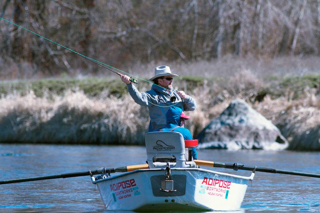 Les Bouck of Everett makes a cast while searching for trout on the Yakima. (Mike Benbow photo)