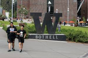 Students walk to classes at the UW Bothell campus on May 5, 2018 in Bothell, Wash. (Andy Bronson / The Herald)